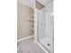 A bathroom features a glass door shower and shelving at 2200 S Fort Apache Rd # 2175, Las Vegas, NV 89117