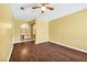 A bedroom with wood-look floors leads to a bathroom with dual vanities at 2200 S Fort Apache Rd # 2175, Las Vegas, NV 89117
