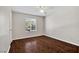 A bedroom features wood-look floors and a window with blinds at 2200 S Fort Apache Rd # 2175, Las Vegas, NV 89117