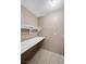 A walk-in closet features tile floors and a white shelf at 2200 S Fort Apache Rd # 2175, Las Vegas, NV 89117
