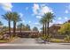 Community entrance with lush landscaping and well-manicured entryway at 2200 S Fort Apache Rd # 2175, Las Vegas, NV 89117