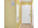 Bright entryway with white front door and tile flooring at 2200 S Fort Apache Rd # 2175, Las Vegas, NV 89117