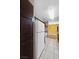 A kitchen featuring stainless steel appliances and white tile flooring at 2200 S Fort Apache Rd # 2175, Las Vegas, NV 89117