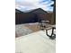 This backyard features a gravel area at 2379 Albury Ave, North Las Vegas, NV 89086