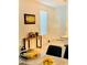 Bright dining room with light tile flooring, console table, and modern art at 2379 Albury Ave, North Las Vegas, NV 89086