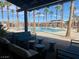 Enjoy the community pool surrounded by palm trees and shaded lounge areas at 2379 Albury Ave, North Las Vegas, NV 89086