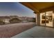 Covered patio with mountain views and desert landscaping at 2388 Orangeburg Pl, Henderson, NV 89044