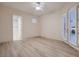Bright bedroom offers ample space, wood-look flooring, and natural light at 2388 Orangeburg Pl, Henderson, NV 89044