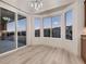 Breakfast nook with large windows, mountain views, and sliding door access to the backyard at 2388 Orangeburg Pl, Henderson, NV 89044
