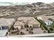 Beautiful single-story home with a three-car garage and landscaped front yard at 2388 Orangeburg Pl, Henderson, NV 89044