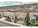 Stunning single-story home featuring a tile roof, three-car garage, and desert landscaping against a mountain backdrop at 2388 Orangeburg Pl, Henderson, NV 89044