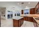 Gourmet kitchen with an island, stainless steel appliances, and bright breakfast nook at 2388 Orangeburg Pl, Henderson, NV 89044