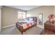 Well-lit bedroom with a window, dresser, and bed, ideal for relaxation and rest at 4125 Glenfield Cir, Las Vegas, NV 89129