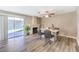 Bright dining area with a fireplace and sliding glass doors leading to an outdoor patio space at 4125 Glenfield Cir, Las Vegas, NV 89129