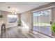 Bright dining area with sliding glass doors and ample natural light, leading to the outdoor space at 4125 Glenfield Cir, Las Vegas, NV 89129