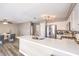 Spacious kitchen with a breakfast bar, stainless steel appliances, and an adjoining dining area at 4125 Glenfield Cir, Las Vegas, NV 89129
