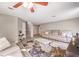 Cozy living room with neutral paint, modern flooring, and a comfortable seating arrangement at 4125 Glenfield Cir, Las Vegas, NV 89129