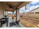 Covered back patio with a ceiling fan, grill, and view of the backyard at 4459 Lavender, Pahrump, NV 89061