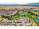 Overhead view of a community featuring a golf course, ponds, and neat landscaping at 4571 S Via Roma Dr, Pahrump, NV 89061