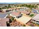 Overhead view showcases homes, landscape, and mountains, with potential for spacious backyard customization at 4571 S Via Roma Dr, Pahrump, NV 89061
