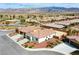 Wide aerial perspective of a community, highlighting desert landscapes and mountain views at 4571 S Via Roma Dr, Pahrump, NV 89061