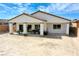 Large backyard with a covered patio ideal for entertaining and relaxation at 4571 S Via Roma Dr, Pahrump, NV 89061