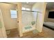 Modern bathroom featuring a glass shower with a tiled floor at 4571 S Via Roma Dr, Pahrump, NV 89061
