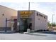 Modern car wash exterior with brick facade, clearly marked entrance, and convenient access for a quick and easy cleaning at 4571 S Via Roma Dr, Pahrump, NV 89061