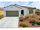 Inviting single-story residence boasting a low-maintenance front yard and a convenient two-car garage at 4571 S Via Roma Dr, Pahrump, NV 89061