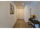 Inviting hallway featuring wood-look tile flooring, recessed lighting, and neutral paint at 4571 S Via Roma Dr, Pahrump, NV 89061