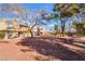 The community offers an abundance of mature trees and manicured landscaping at 466 Las Casitas Way, Las Vegas, NV 89121