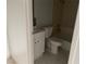 A bathroom with a toilet, a sink with a vanity, and a shower-tub combo at 4774 Lucite Ln, Las Vegas, NV 89115