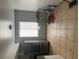The kitchen features stainless steel appliances, including a refrigerator, and tile flooring at 4774 Lucite Ln, Las Vegas, NV 89115