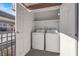 Exterior laundry closet with washer and dryer units at 5422 River Glen Dr # 373, Las Vegas, NV 89103