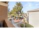 Balcony view of the community pool and landscaping at 555 E Silverado Ranch Blvd # 2114, Las Vegas, NV 89183