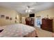 Bedroom featuring a bed, carpet flooring, with backyard access at 60 Mesa Rivera St, Henderson, NV 89012