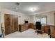 View of the home office featuring carpet, wood cabinets and drawers, and a window at 630 Otono Dr, Boulder City, NV 89005