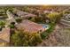 Beautiful home with a tile roof, covered patio, pool, and play area at 71 Fountainhead Cir, Henderson, NV 89052
