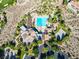 Gorgeous aerial view of community clubhouse and pool with stunning desert landscaping and walking trails at 71 Fountainhead Cir, Henderson, NV 89052