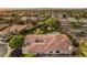 Expansive home site with mature landscaping, tiled roof, and pool at 71 Fountainhead Cir, Henderson, NV 89052