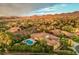 A home with a sparkling pool, beautiful landscaping and mountain views at 71 Fountainhead Cir, Henderson, NV 89052