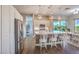 Open kitchen features a large island with pendant lighting, stainless steel appliances at 71 Fountainhead Cir, Henderson, NV 89052