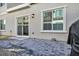 Relaxing backyard patio featuring pavers, a sliding glass door and updated exterior lighting at 7348 N Decatur Blvd # 5, Las Vegas, NV 89131