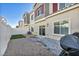 Cozy backyard with a paved patio, rock landscaping and a patch of artificial grass at 7348 N Decatur Blvd # 5, Las Vegas, NV 89131