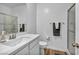 Bathroom with white cabinets, a shower, and wood floors at 7348 N Decatur Blvd # 5, Las Vegas, NV 89131