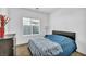 Cozy bedroom with a window, carpeted floors, and minimalist decor at 7348 N Decatur Blvd # 5, Las Vegas, NV 89131