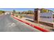 Welcome to Roxbury, shown is the community entrance sign with landscaped surroundings and a well-maintained roadway at 7348 N Decatur Blvd # 5, Las Vegas, NV 89131