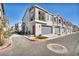Townhome exteriors showcase multi-car garages and contemporary architecture at 7348 N Decatur Blvd # 5, Las Vegas, NV 89131