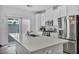 Kitchen island, stainless steel appliances, and access to outside at 7348 N Decatur Blvd # 5, Las Vegas, NV 89131