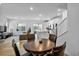 Open-concept dining/living area with kitchen and hardwood floors at 7348 N Decatur Blvd # 5, Las Vegas, NV 89131